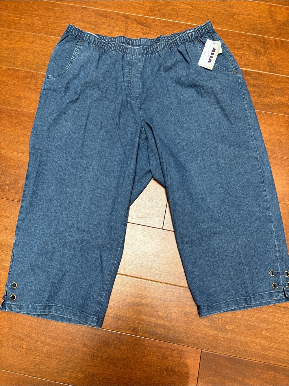 Alia Medium Blue Denim Capri Pants with Eyelet Hem Detail